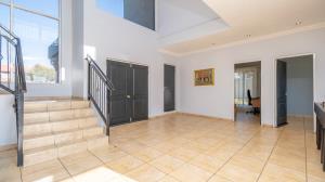 Inviting four bedroom three bathroom family gem with spacious yard in peaceful security estate. - M128761