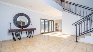 Inviting four bedroom three bathroom family gem with spacious yard in peaceful security estate. - M128761