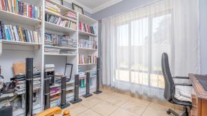 Inviting four bedroom three bathroom family gem with spacious yard in peaceful security estate. - M128761