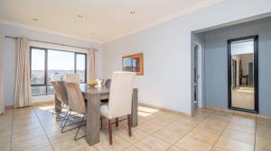 Inviting four bedroom three bathroom family gem with spacious yard in peaceful security estate. - M128761