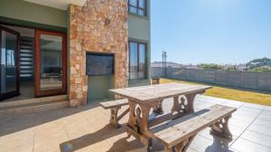 Inviting four bedroom three bathroom family gem with spacious yard in peaceful security estate. - M128761
