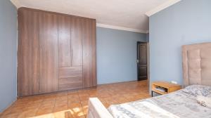 Inviting four bedroom three bathroom family gem with spacious yard in peaceful security estate. - M128761