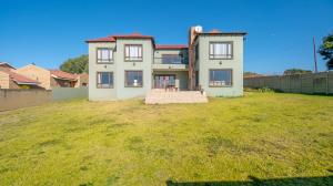 Inviting four bedroom three bathroom family gem with spacious yard in peaceful security estate. - M128761