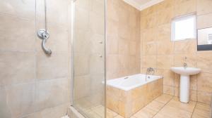 Inviting four bedroom three bathroom family gem with spacious yard in peaceful security estate. - M128761