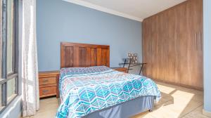 Inviting four bedroom three bathroom family gem with spacious yard in peaceful security estate. - M128761