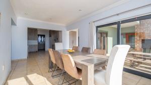 Inviting four bedroom three bathroom family gem with spacious yard in peaceful security estate. - M128761
