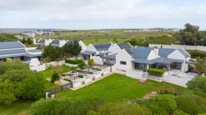 PRIME SMALLHOLDING FOR SALE IN OLIFANTSKOP ESTATE — EXCEPTIONAL VERSATILITY & INVESTMENT POTENTIAL - M128770